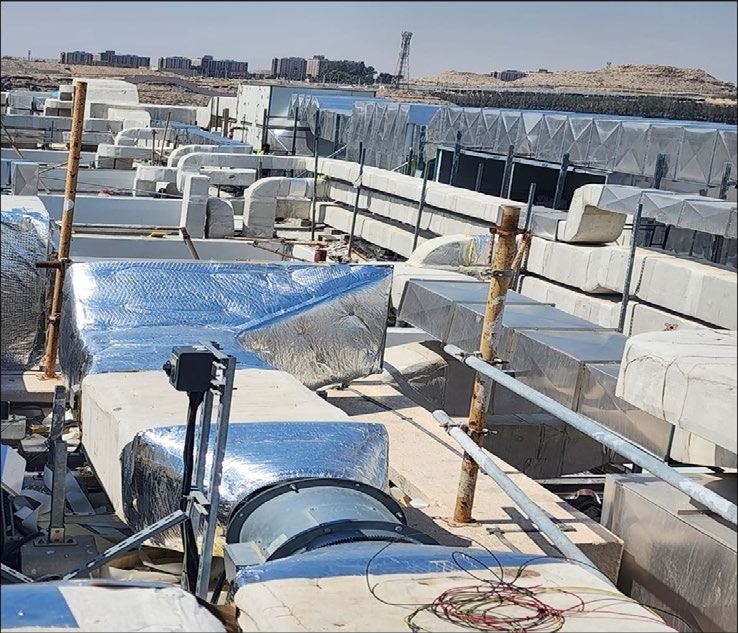Insulated ductwork staged on roof