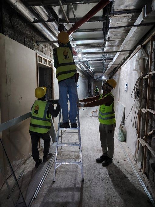 3DV crew installing ceiling MEP services